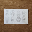 8 graphite sketches of floating lantern monsters.