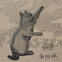 A whimsical black-and-cream illustration of a large cat reaching upward in a snowy outdoor scene with mountains, clouds, a small house, and two chairs.