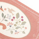 Card with fox, bird, and floral design on a pink border