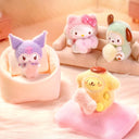 Set of fluffy Sanrio Characters in flocked pastel colored costumes, all holding small objects.