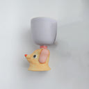 Ceramic gray cup with a brown and pink  floppy eared dog as a handle.