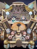 Mixed media sculpture of a cute cartoon person and a monkey piloting an open air plane shaped like a cats head, with many attached parts and pieces and a snout in the center. Bugs fly around it.