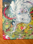 Colorful illustration on a neoprene desk mat of a dragon and fairies in a fantasy landscape with stars and flowers.