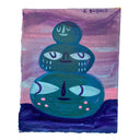 Painting of a stack of 3 dark teal spheres, all with different faces on them. The stack is in a purple empty landscape.
