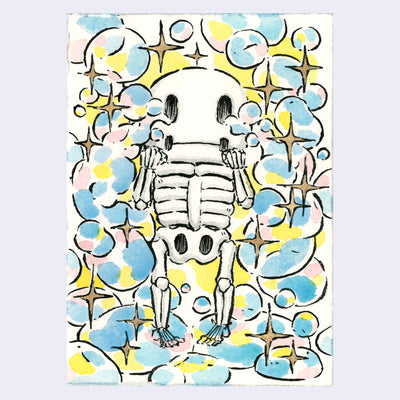 Ink and watercolor illustration of a cartoon skeleton covering in blue and pink bubbles, with gold sparkles. Background is yellow.