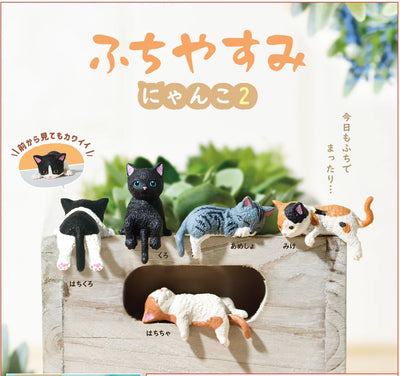 5 small cat figurines, laying or sitting in different positions to indicate they are resting. Colorways vary: tuxedo cat, black cat, gray cat, calico cat and orange and white cat.