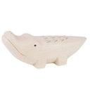Wooden figurine of a crocodile with a cute, smiling face.