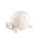 White turtle figurine on a white background