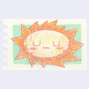 Colored pencil illustration of a sun with very pointy sun rays and a closed eye, calm facial expression.