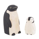 2 small wooden figurines of penguins, one is a parent and the other is a child.