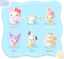 Set of fluffy Sanrio Characters in flocked pastel colored costumes, all holding small objects.