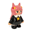 Ceramic figure of a girl with pink hair, yellow star bowsand black outfit on a white background 