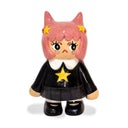 Ceramic figure of a girl with pink hair, yellow star bowsand black outfit on a white background 