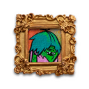 Mini painting of a green haired monster man, in an ornate gold frame.