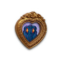 Heart-shaped decorative frame with a blue creature design inside a gold frame on a white background