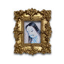 A small framed artwork featuring a stylized portrait of a woman with dark hair and blue accents, set within an ornate gold picture frame on a white background.