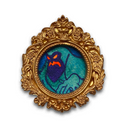 An ornate oval gold frame brooch featuring a painted illustration of a purple monster with glowing orange eyes and mouth on a textured teal background.