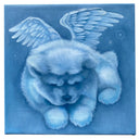 Blue monochromatic painting of a fluffy puppy dog, laying on the ground with angel wings atop its back.