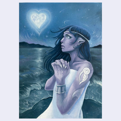 Blue monochromatic painting of an elven-like character in a stance with clasped hands, looking up at a heart shaped moon in a night time ocean landscape.