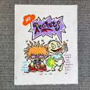 A hand-drawn cartoon art print featuring characters resembling Tommy and Chuck from Rugrats, with the text 'NO Regrets', displayed on a gray textured fabric background.