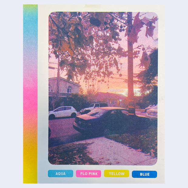 Risograph print of a sunset photograph on a street. There is text below and a color chart for the CMYK values.