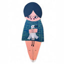 Die cut wooden painting of a girl holding a bird with a blue checkered dress on a white background