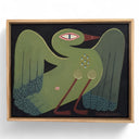 Framed painting of a stylized green swan type bird, with its wings outspread.
