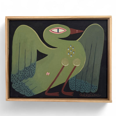 Framed painting of a stylized green swan type bird, with its wings outspread.