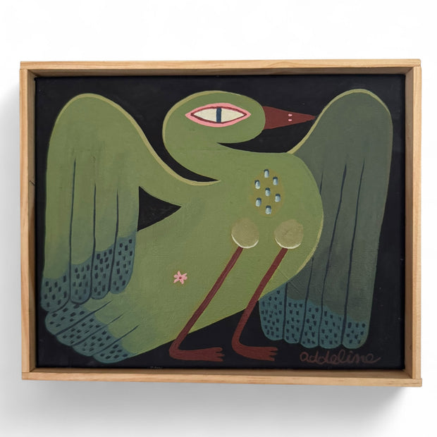 Framed painting of a stylized green swan type bird, with its wings outspread.