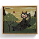 Framed artwork of a stylized black cat with a human-like body. It sits in the grass with a mountainous landscape in the background.