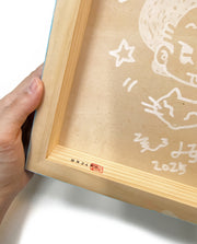 Wooden frame with a signature and date on a white background