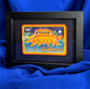 Framed illustration of a cat-shaped vehicle with 'tap' and 'Catbus' text on a white background