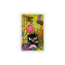 Clay sculpture of Badtz Maru holding a small knife, in a clear plastic packaging with a colorful backing board.