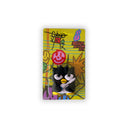 Clay magnet of Badtz Maru holding a small sword, in a plastic packaging with a colorful backing.