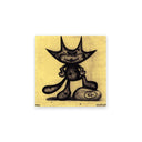 Black cartoon cat character standing with one foot on a deflated soccer ball on a yellow background