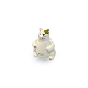 White cat figurine on a white background
