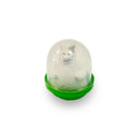 Cat-shaped object inside a transparent dome with a green base on a white background