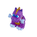Purple cartoon-like sculpture of a dinosaur with a bone in its mouth like a dog.