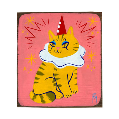 Painting on flat wooden panel of a fluffy striped orange cat. Its face is subtly painted like a clown, has a white collar and a red pointed hat. Background is a salmon pink.
