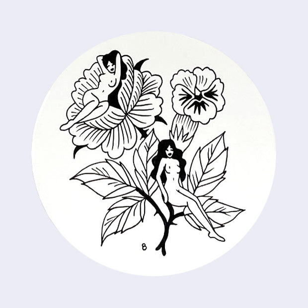 Black ink drawing on white circular paper of 2 nude woman sitting in flowers with thorny leafy stems.