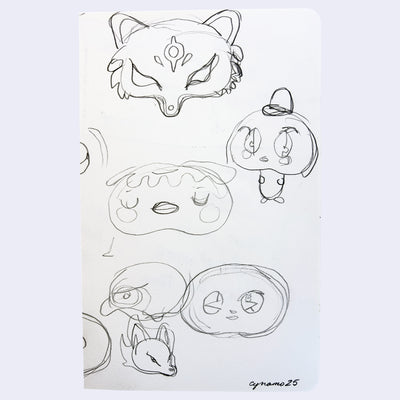 Graphite sketches on white paper of yokai - kitsune, kappa and others.