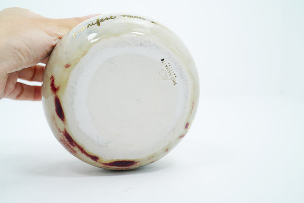 Underside of ceramic pot, unglazed.