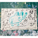 Ink doodles on an index card of a frog, snail and caterpillar all with human-like facial expressions.