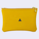 Yellow pouch with a gold zipper on a light gray background