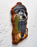 Mixed media artwork of a raccoon in a trashcan, with trash scattered all around.