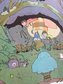Illustration of a forest scene at night, with a sleeping Totoro and 2 small girls sleeping atop or along side him.