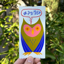 Retro art style painting of a green and blue owl with a speech bubble with code like symbols.