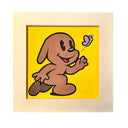 Illustration of a cartoon dog character with a butterfly on a yellow background, framed in beige.