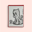 Art featuring a black and white cartoon cat sitting next to a small flower, with a red border, displayed against a pale pink background.