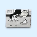 A rectangular artwork featuring a black and white cartoon illustration of a person in the water with a shark fin and the text 'NO JOBS LEFT IN THE OCEAN?' on a light blue background.